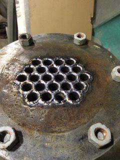 Welded tube sheet on a heat exchanger end plate