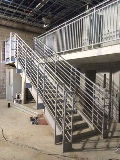Fabricated steel stairs and guardrails inside a building